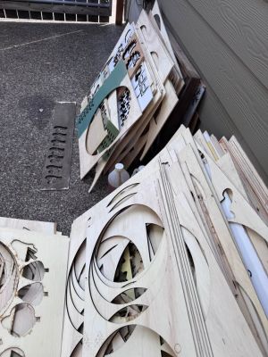Bulk Laser Cut Plywood Scrap Sheets, 1/4 “ plywood, some raw some painted.  And I think oak panels.