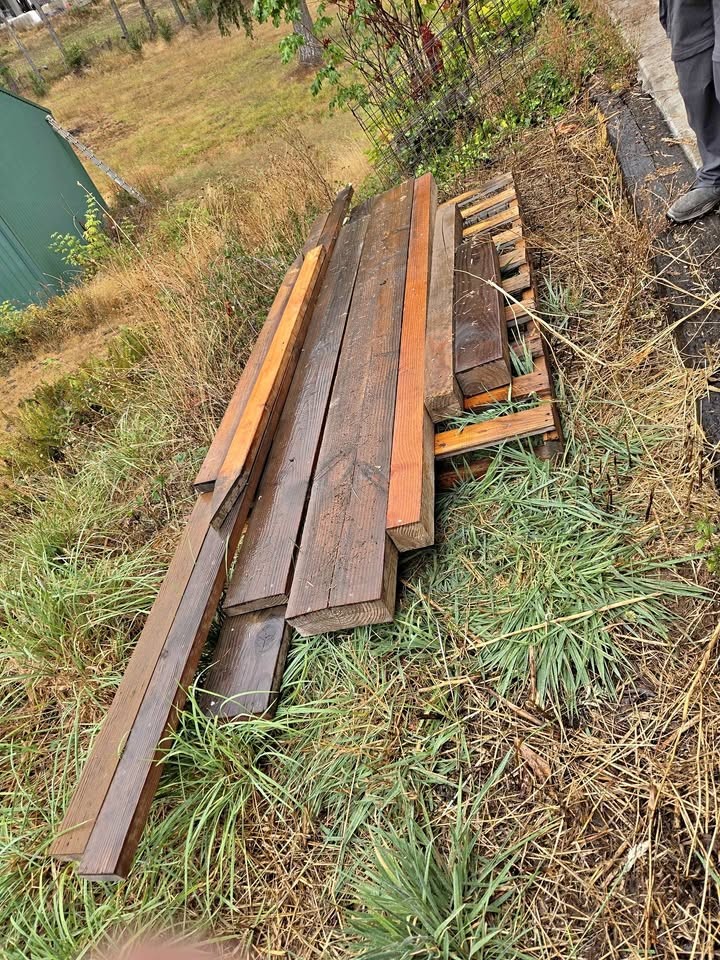 Various pieces of lumber. - Image 1