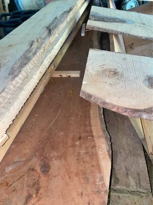 Live edge & rough cut lumber wood boards