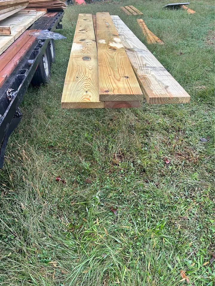 Five pieces of 2 x 10 x 12 treated new