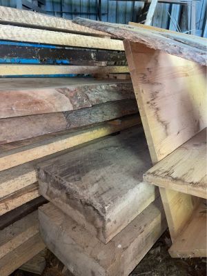 Live edge & rough cut lumber wood boards
