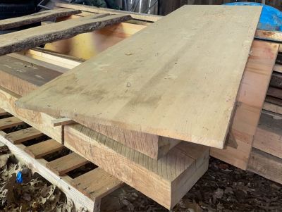 Live edge & rough cut lumber wood boards