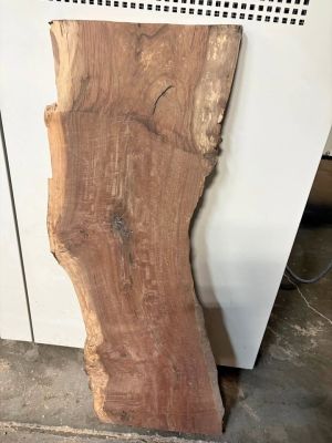 Walnut slab in the shape of the state of California.