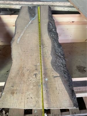Live edge & rough cut lumber wood boards